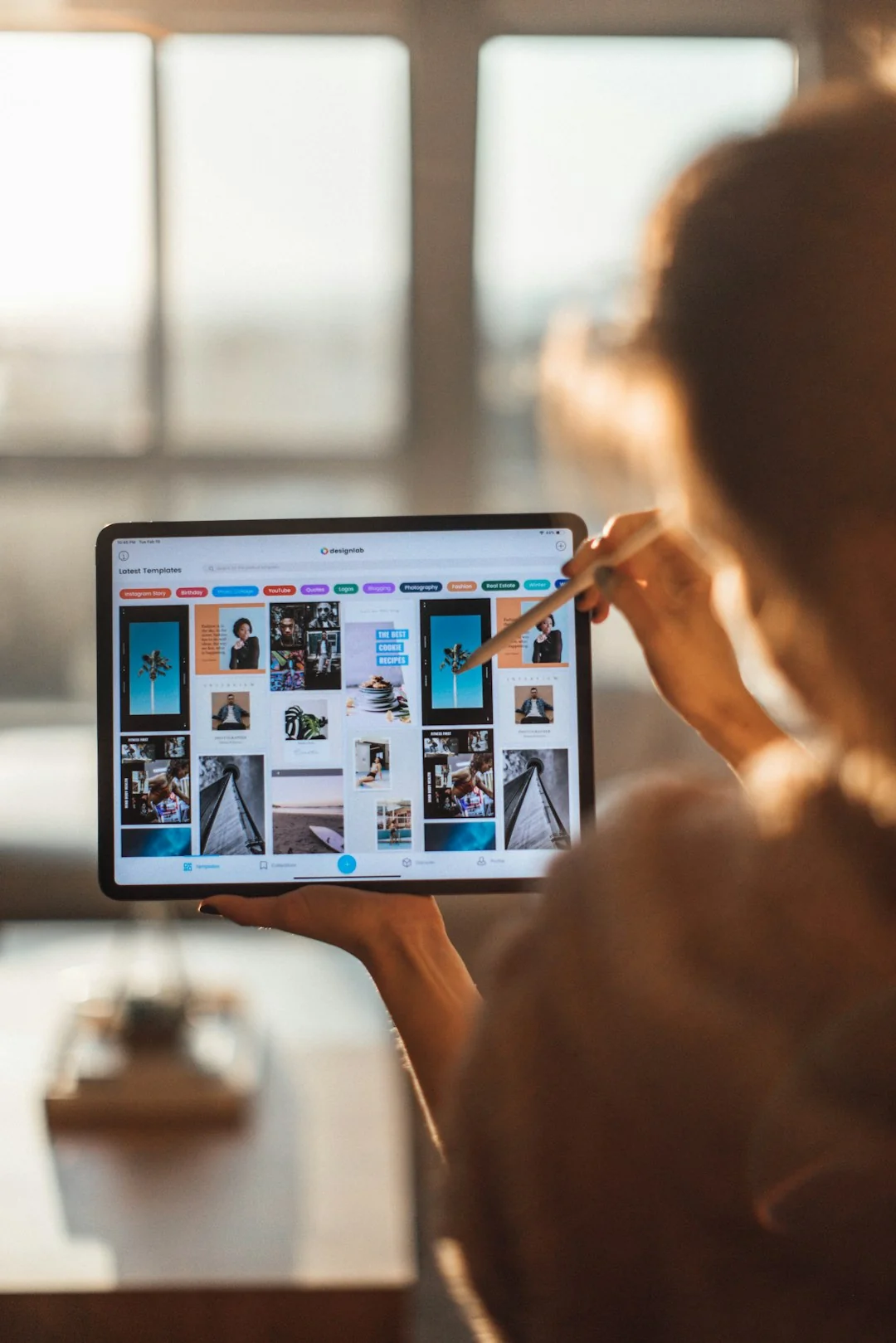 Stylish and efficient workspace with multiple monitors, laptop, and smartphone, showcasing a web design project.